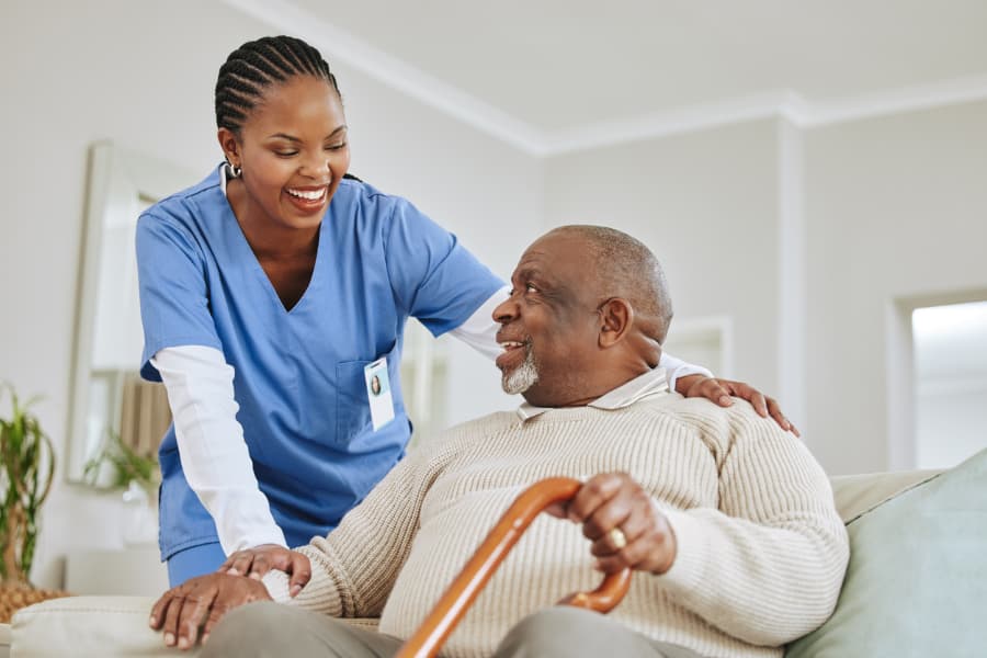 Live-in caregiver helping a senior at home overnight in Maitland, Central Florida
